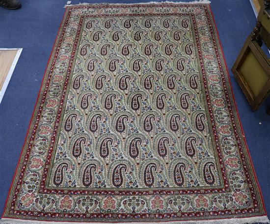 A Tabriz rug, woven with botehs 205x 140cm